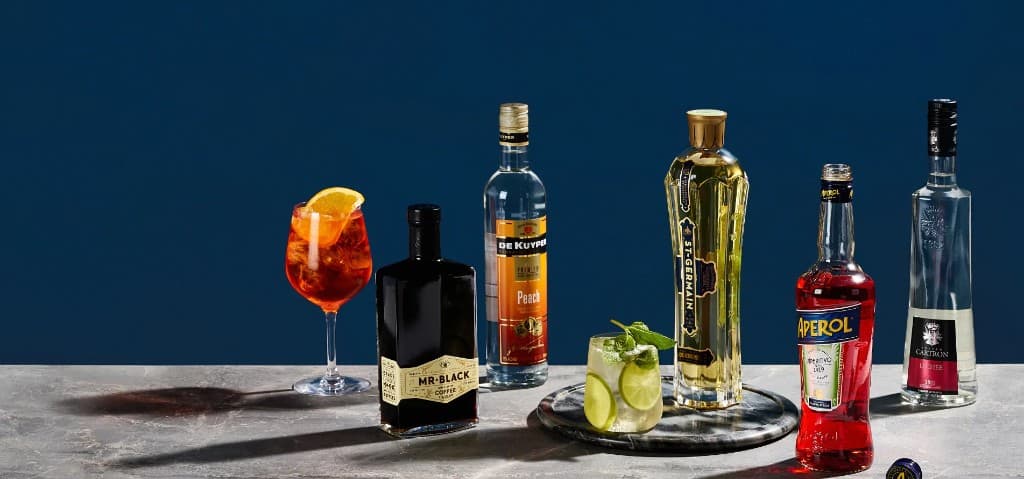 Paramount Liquor — Dark navy/blue branded e-commerce platform — multi-brand wholesale liquor marketplace with Evolution Rewards.